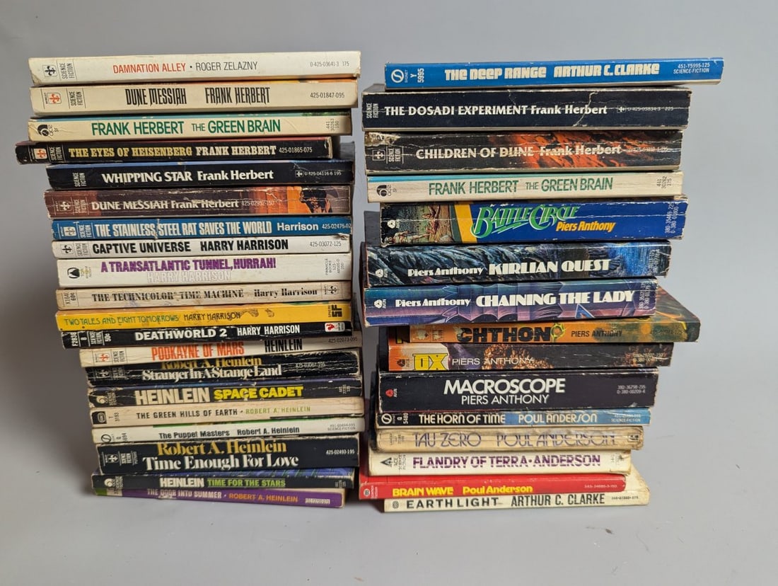 Classic Sci-Fi Collectibles by Roger Zelazny, Frank Herbert, Harry Harrison & Heinlein: **Important** Please read below description on how to avoid high shipping costs. This auction showcases an incredible collection of classic science fiction books from renowned authors like Roger Zelaz