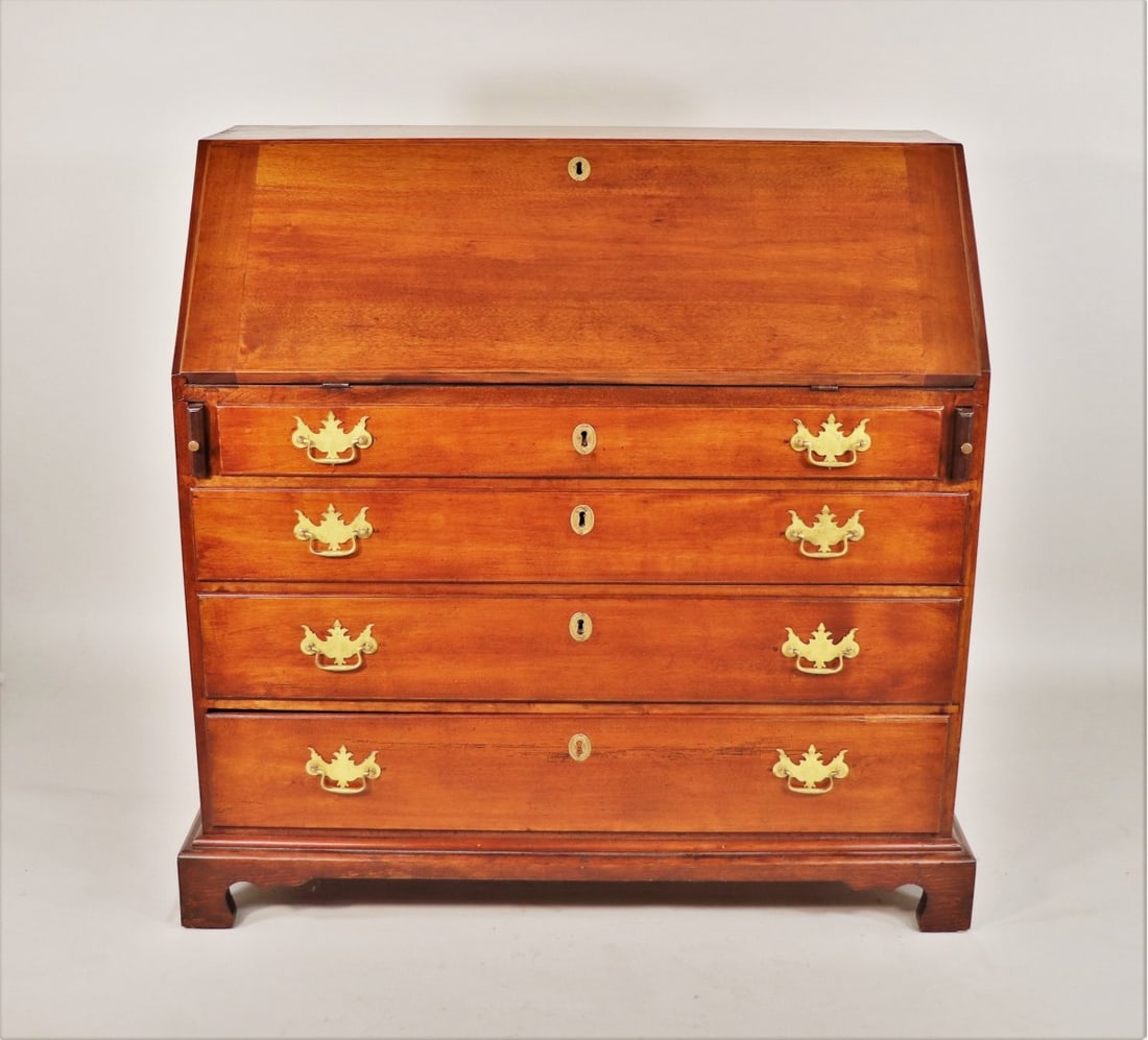 Early 19th Century American Mahogany Slant Desk with Brass Hardware and Key: **Important** Please read below description on how to avoid high shipping costs. Discover this exquisite Early 19th Century American Mahogany Slant Desk, a testament to fine cabinetmaking. Standing at