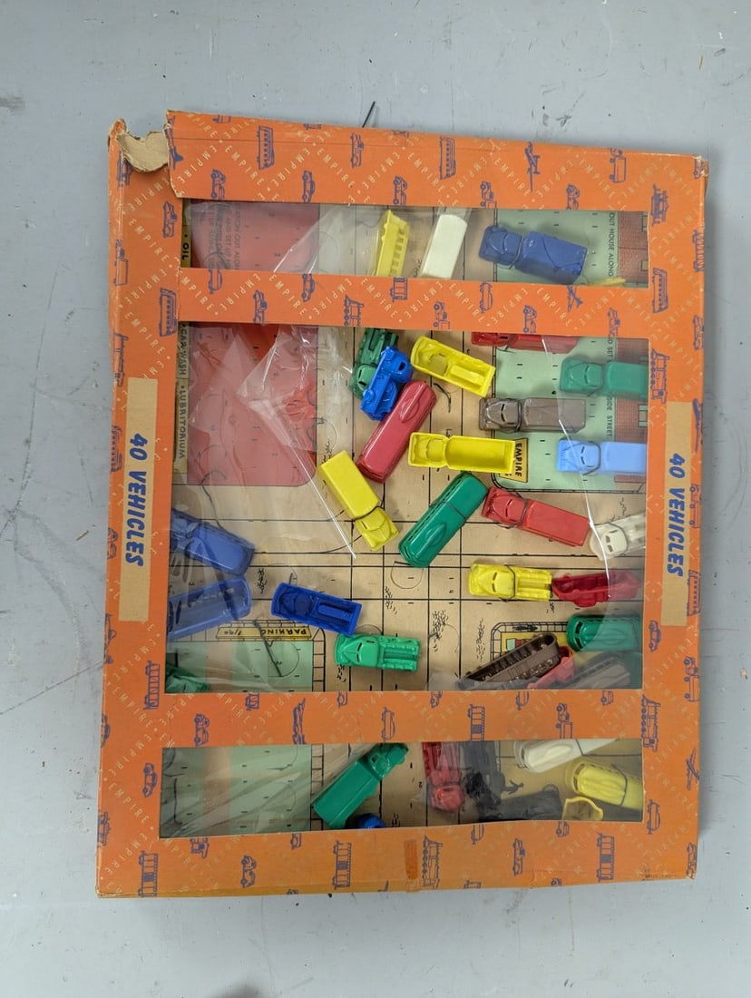 Vintage Empire Plastic Corp 40 Vehicles Play Set Classic Toy Collection: **Important** Please read below description on how to avoid high shipping costs. Discover a nostalgic gem with this Vintage Empire Plastic Corp. 40 Vehicles Play Set. With dimensions of 16 x 12 x 1
