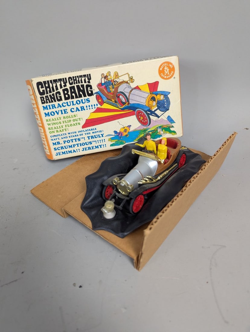 Mattel Chitty Chitty Bang Bang Movie Car with Box & Inflatable Raft Accessory: **Important** Please read below description on how to avoid high shipping costs. Up for auction is a classic Mattel Chitty Chitty Bang Bang toy car from the beloved 1968 film. This set includes the