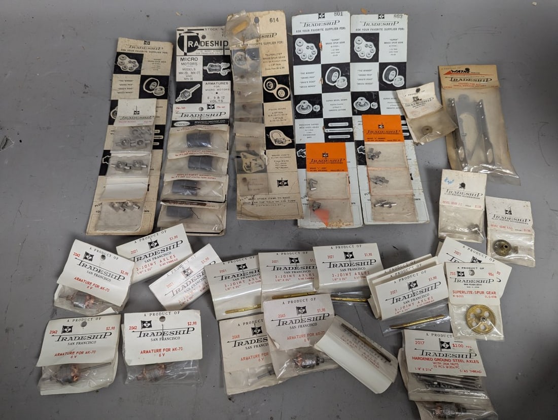 Large Lot of Vintage 1960s Tradeship NOS Slot Car Parts for Collectors and Restorers: **Important** Please read below description on how to avoid high shipping costs. Explore this remarkable Lot of new old stock featuring a variety of vintage Tradeship NOS slot car parts from the