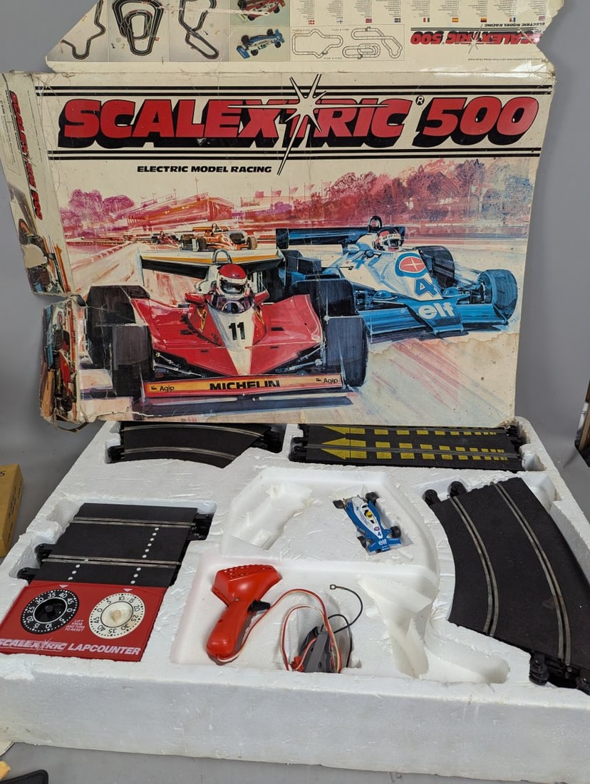 Vintage Scalextric 500 Electric Model Racing Set Incomplete for Collectors Parts Restoration: **Important** Please read below description on how to avoid high shipping costs. This Vintage Scalextric 500 Electric Model Racing Set measures 31 x 5 1/2 x 23. Please note that it is incomplete, miss