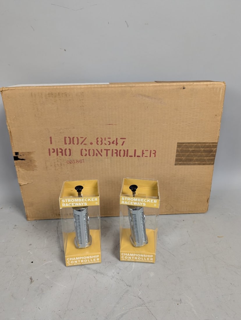 Strombecker Raceways Championship Controllers Set of 8 NOS in Original Shipping Box: **Important** Please read below description on how to avoid high shipping costs. 20 x 14 x 3 1/2. Set of 8 new old stock in original shipping box. Each controller is contained in its own individual