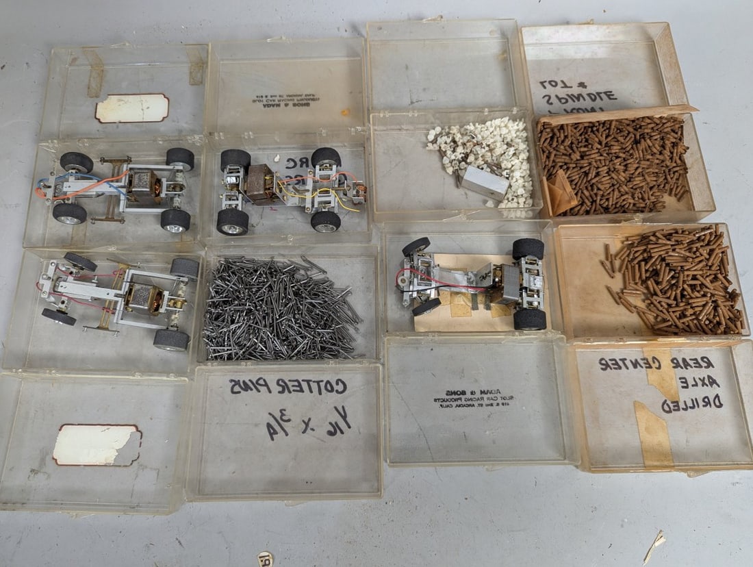 Vintage 1/24 Scale Slot Car Chassis and Parts by Adam & Sons Racing Products: **Important** Please read below description on how to avoid high shipping costs. This auction features a remarkable collection of four vintage 1/24 scale slot car chassis and multiple lots of parts,