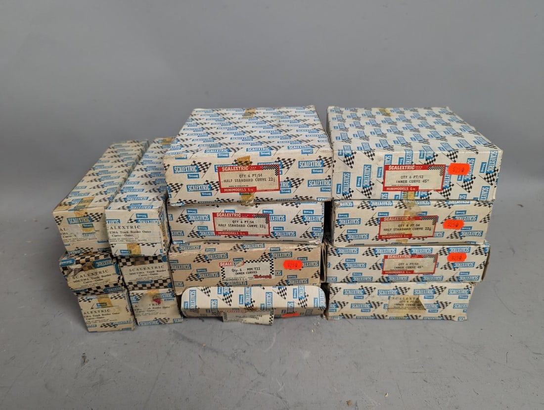 Vintage Scalextric Slot Car Track Collection NOS Minimodels Ltd Unique Find: **Important** Please read below description on how to avoid high shipping costs. Up for auction is a remarkable collection of vintage Scalextric slot car track pieces and accessories in their original