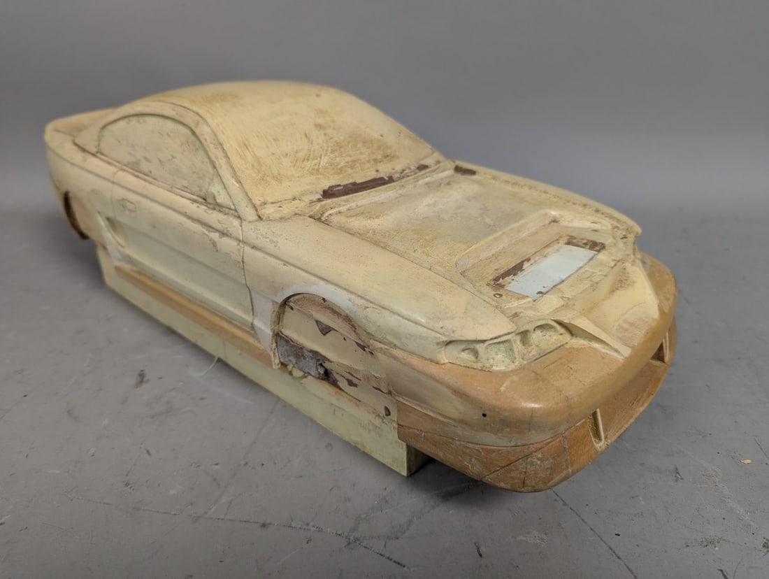 Vintage Carved Wood Model Kit Pattern Mold for 1994-1998 Ford Mustang Collectible: **Important** Please read below description on how to avoid high shipping costs. Up for auction is a 6 x 18 x 6 carved wood model kit mold of a Ford Mustang, a rare industrial artifact from the
