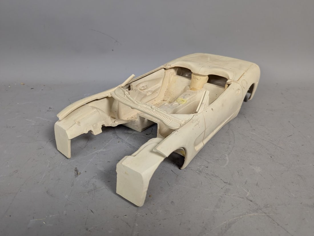 Resin Master Pattern C5 Chevrolet Corvette Model Kit Pre-Production Unique Artifact: **Important** Please read below description on how to avoid high shipping costs. Up for auction is a unique resin model kit mold of a Corvette, measuring 16 x 8 x 3 1/2 inches. This unfinished