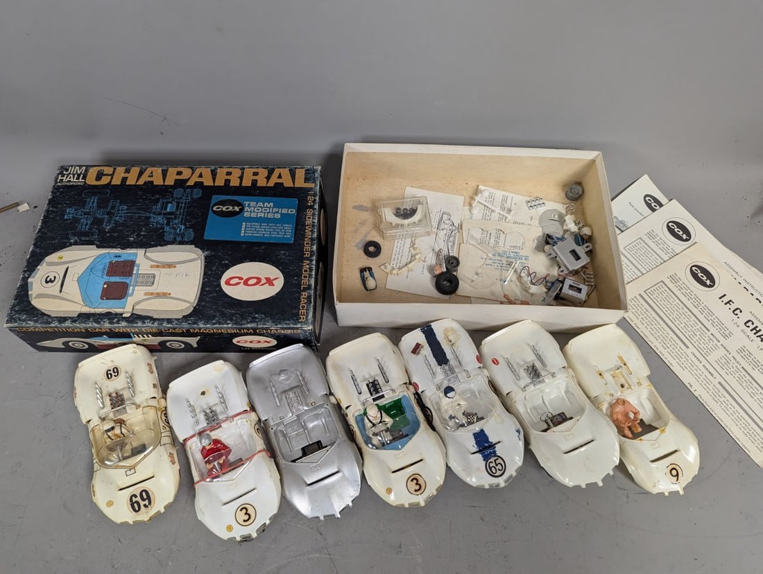 Vintage Cox 1/24 Scale Chaparral Slot Cars Collection with Box and Original Parts: **Important** Please read below description on how to avoid high shipping costs. This extraordinary collection features 6 Cox 1/24 scale Chaparral slot cars, extra boldly displayed with one original