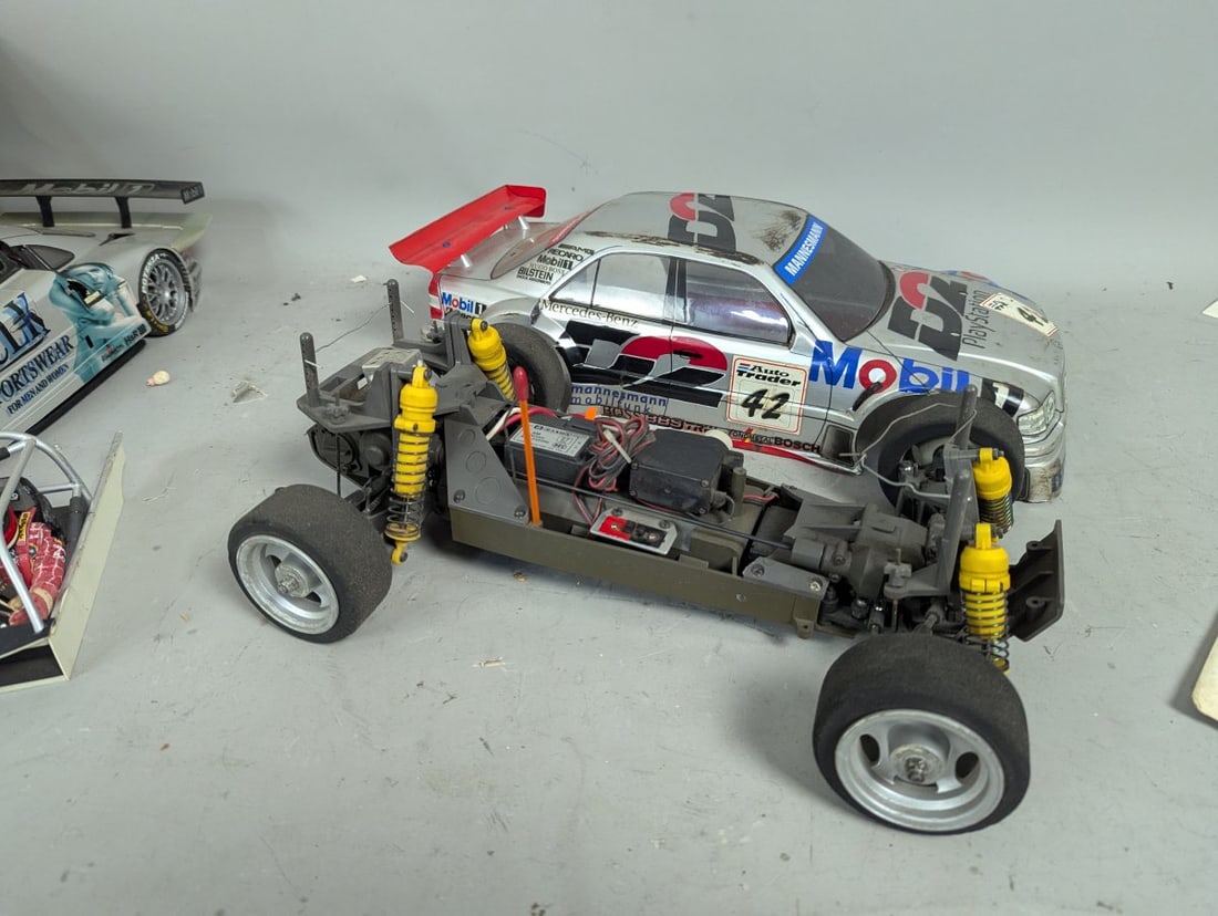 Lot of RC Cars 10 Body Shells Two Chassis Extra Parts Vintage Racing Collectibles - 7