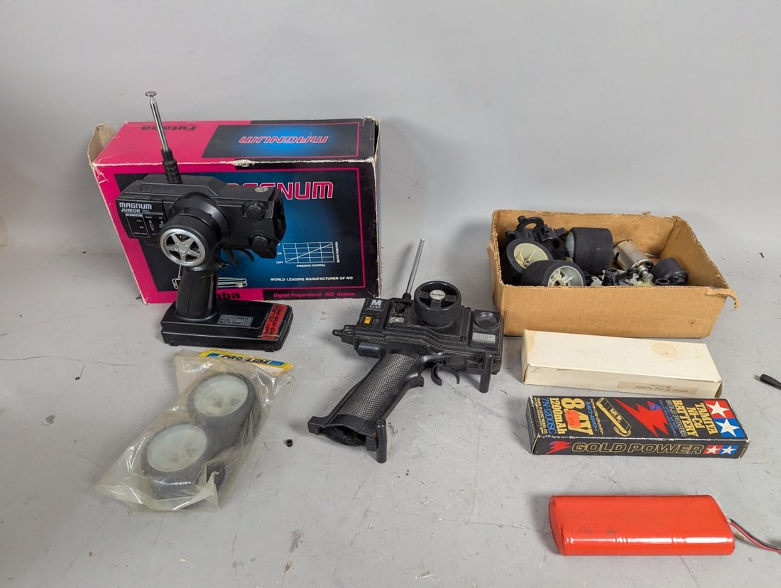 Vintage RC Car Lot Futaba Sanwa Tamiya Pro-Line Transmitters Tires Parts Unused: **Important** Please read below description on how to avoid high shipping costs. Discover this unique collection of vintage radio-controlled (RC) car components and accessories. This lot includes