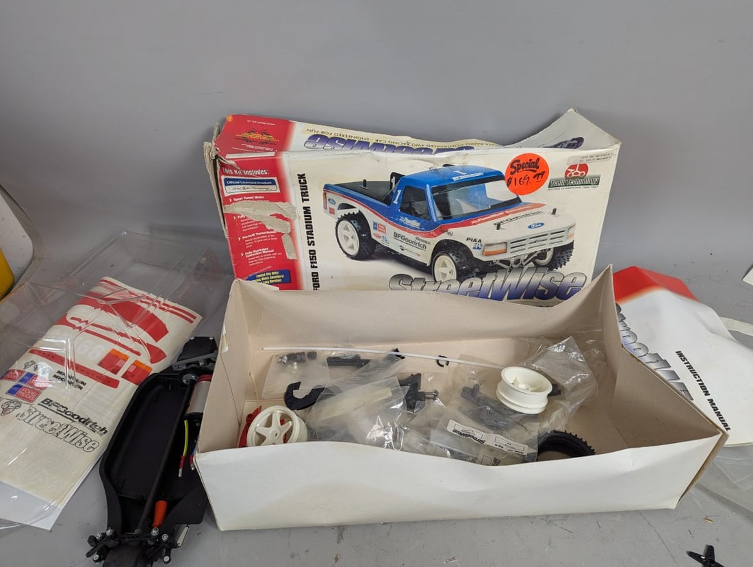StreetWise Ford F150 Stadium Truck RC Car Kit Vintage Tech Technology Unassembled: **Important** Please read below description on how to avoid high shipping costs. Introducing the StreetWise 1/10 Scale Ford F150 Stadium Truck RC Car Kit, an intriguing vintage find! As noted, the dim