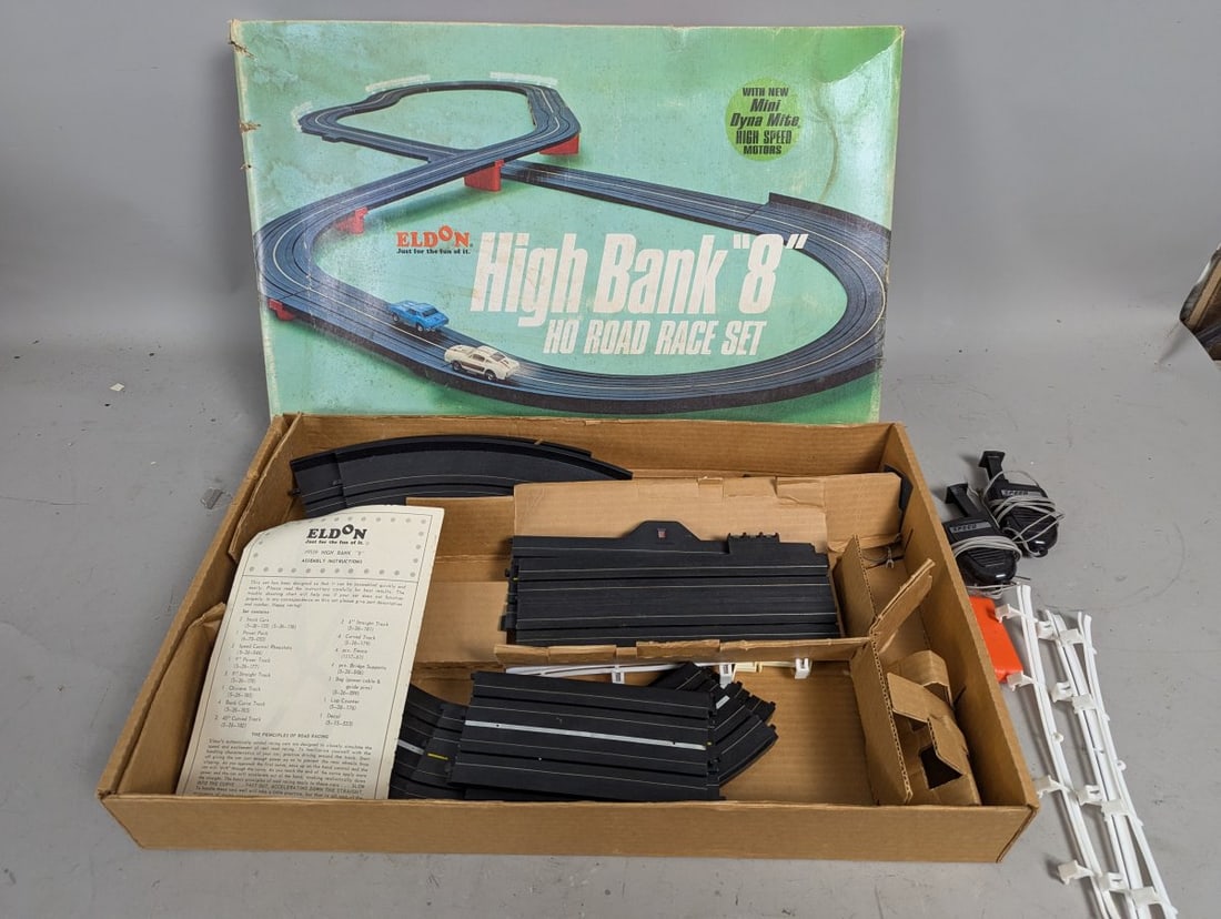 Eldon High Bank 8 HO Road Race Set #9859 Vintage Toy Incomplete Parts Only: **Important** Please read below description on how to avoid high shipping costs. Discover this vintage Eldon #9859 'High Bank 8' HO road race set. Dimensions: 21 x 13 1/2 x 3. Not complete. As found. 