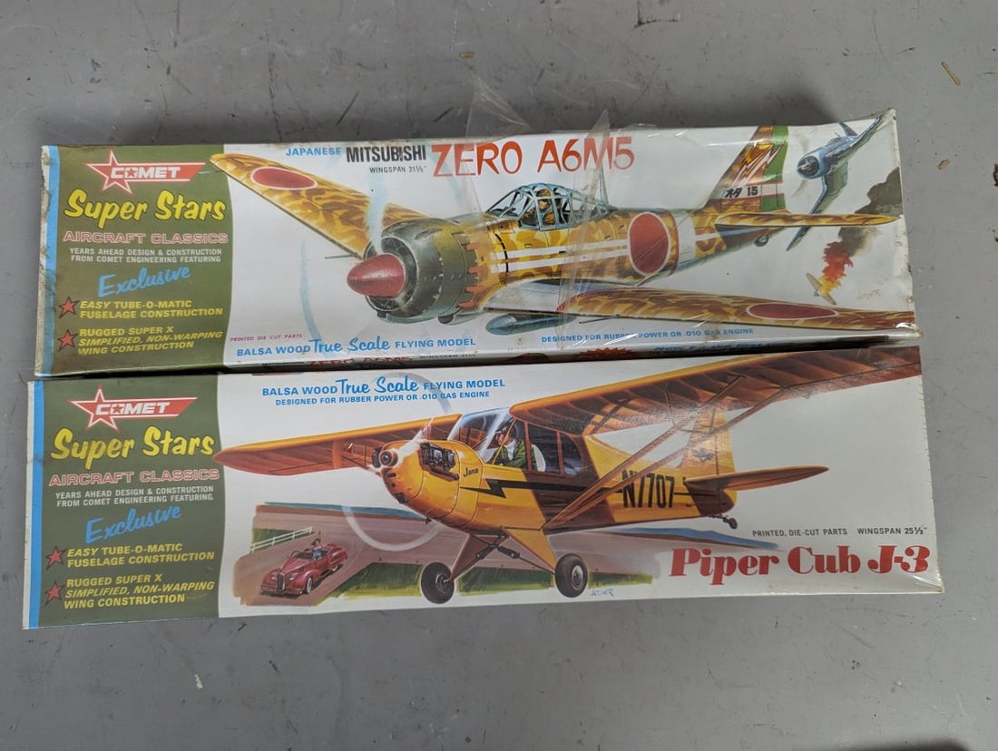Comet Super Stars Balsa Wood Model Kits Lot Piper Cub J-3 Mitsubishi ZERO Sealed: **Important** Please read below description on how to avoid high shipping costs. Presenting a rare lot of two vintage Comet Super Stars balsa wood model kits: the Piper Cub J-3 and the Mitsubishi