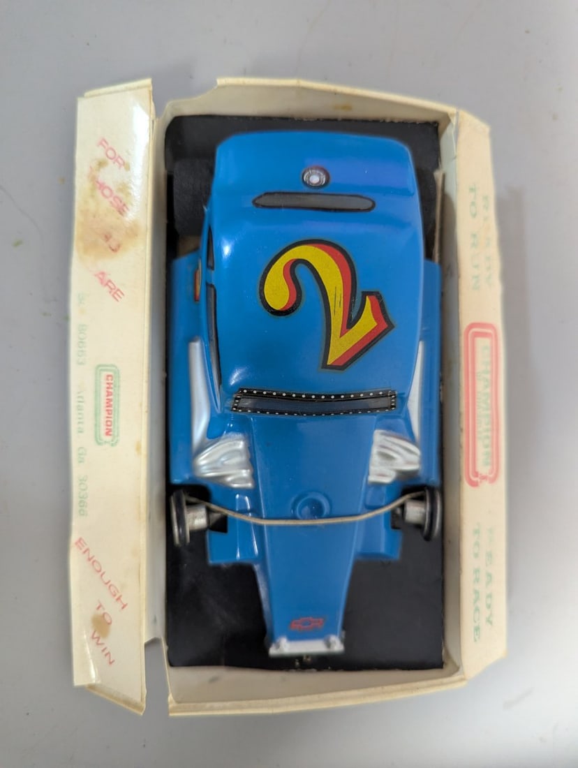 Vintage Champion of Chamblee 1/24 Scale '37 Chevy Modified Slot Car Collectible: **Important** Please read below description on how to avoid high shipping costs. Up for auction is a stunning Vintage Champion of Chamblee 1/24 Scale '37 Chevy Modified Slot Car. This collectible