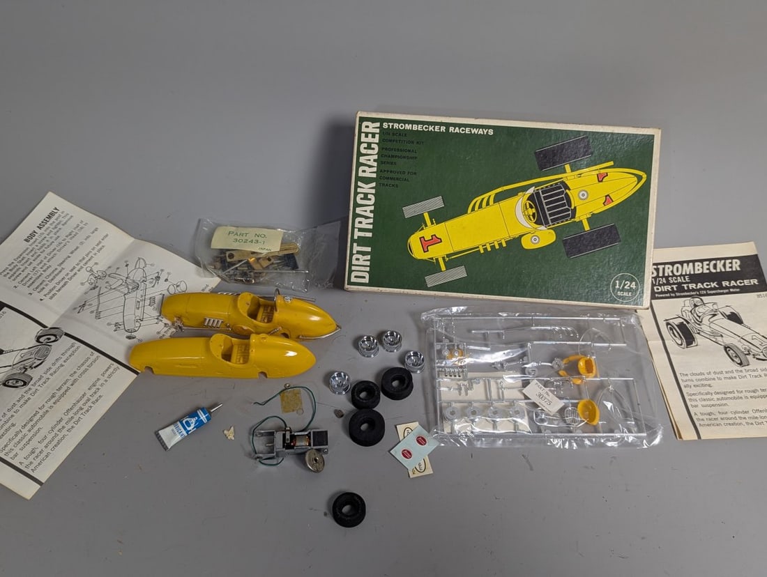 Strombecker 1/24 Scale Dirt Track Racer Slot Car Kit Lot Vintage Parts Unbuilt Partial: **Important** Please read below description on how to avoid high shipping costs. This lot includes a Strombecker Dirt Track Racer slot car kit. Box dimensions are 11 x 7 x 2 1/2. It looks like an unbu
