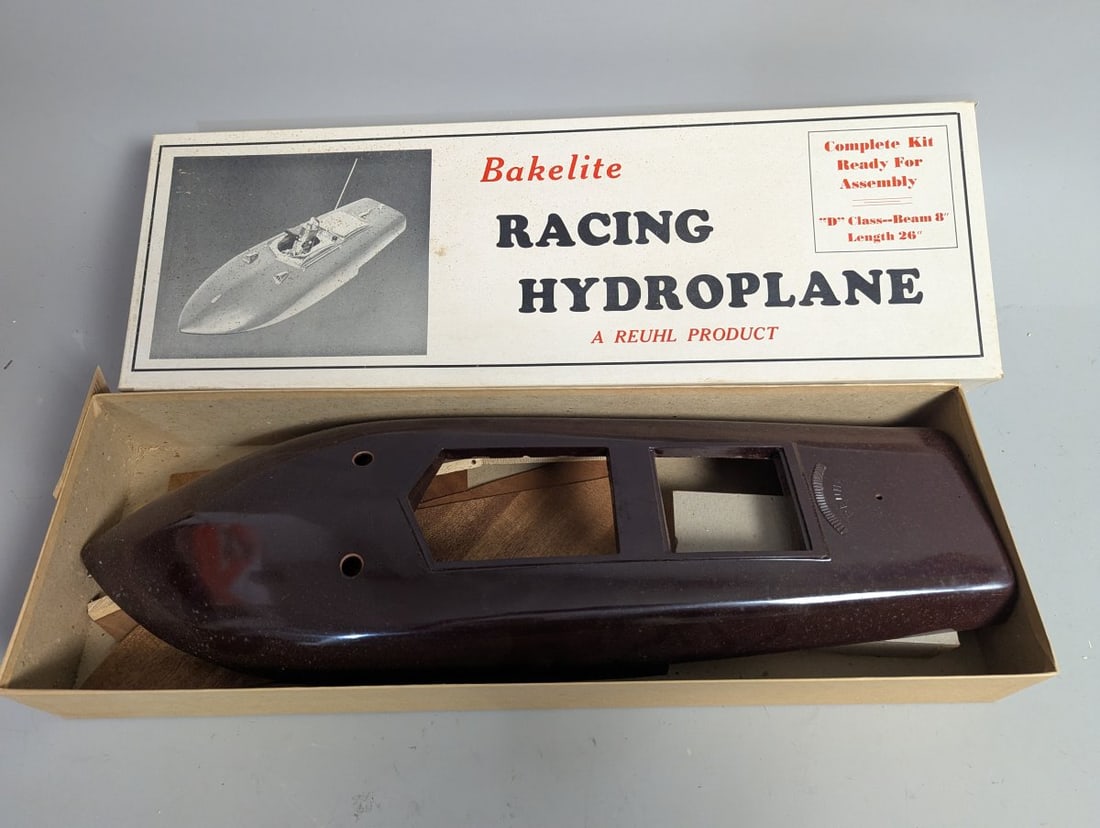 Vintage Reuhl Bakelite Racing Hydroplane Model Kit Unassembled NOS Collectible: **Important** Please read below description on how to avoid high shipping costs. Discover this impressive Vintage Reuhl Bakelite Racing Hydroplane Model Kit, measuring 28 x 8 1/2 x 3 1/2. This New