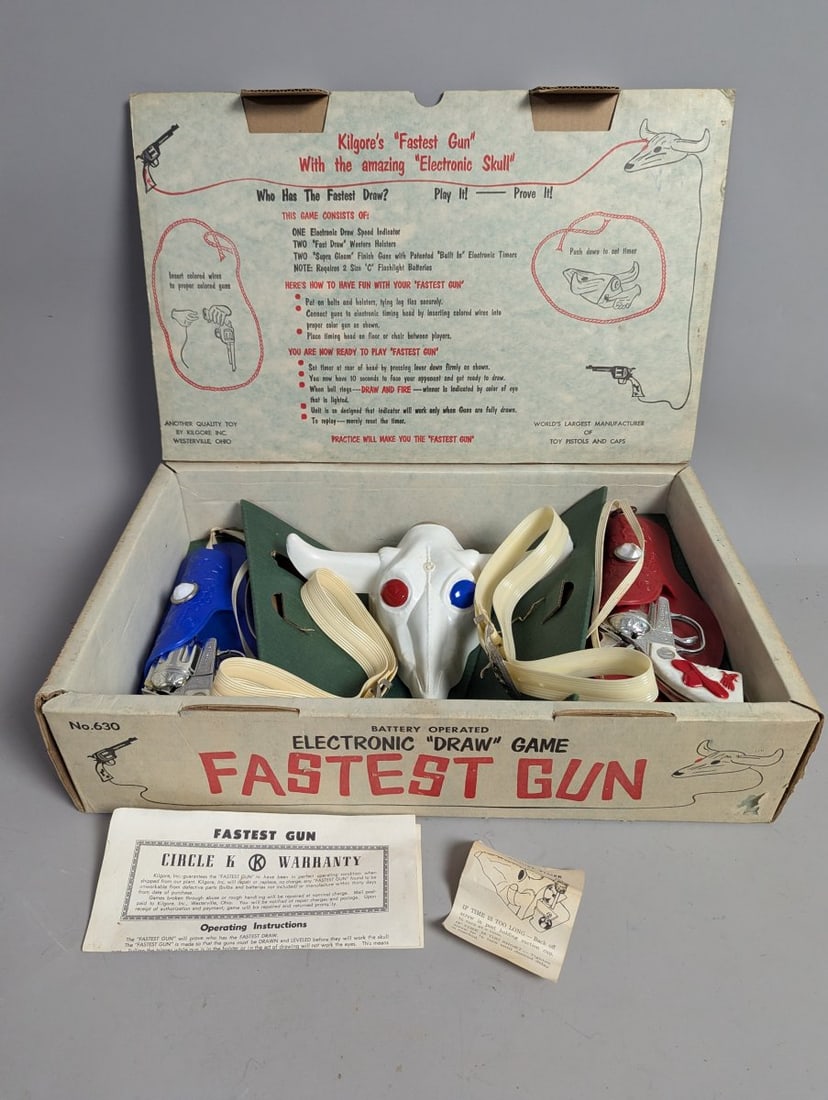 Kilgore Fastest Gun Electronic Draw Game Complete Set with Skull Target and Toy Pistols: **Important** Please read below description on how to avoid high shipping costs. Don't miss your chance to own this rare Kilgore's 'Fastest Gun' Electronic Draw Game (No. 630). This item is new old