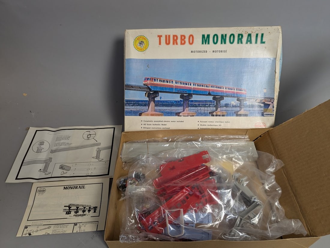 Paramount Turbo Monorail Motorized HO Scale Model Kit 123 Vintage Unbuilt Collectible: **Important** Please read below description on how to avoid high shipping costs. This is a rare New Old Stock Turbo Monorail Motorized HO Scale Model Kit by Paramount. Dimensions are 16 x 11 x 3. The 