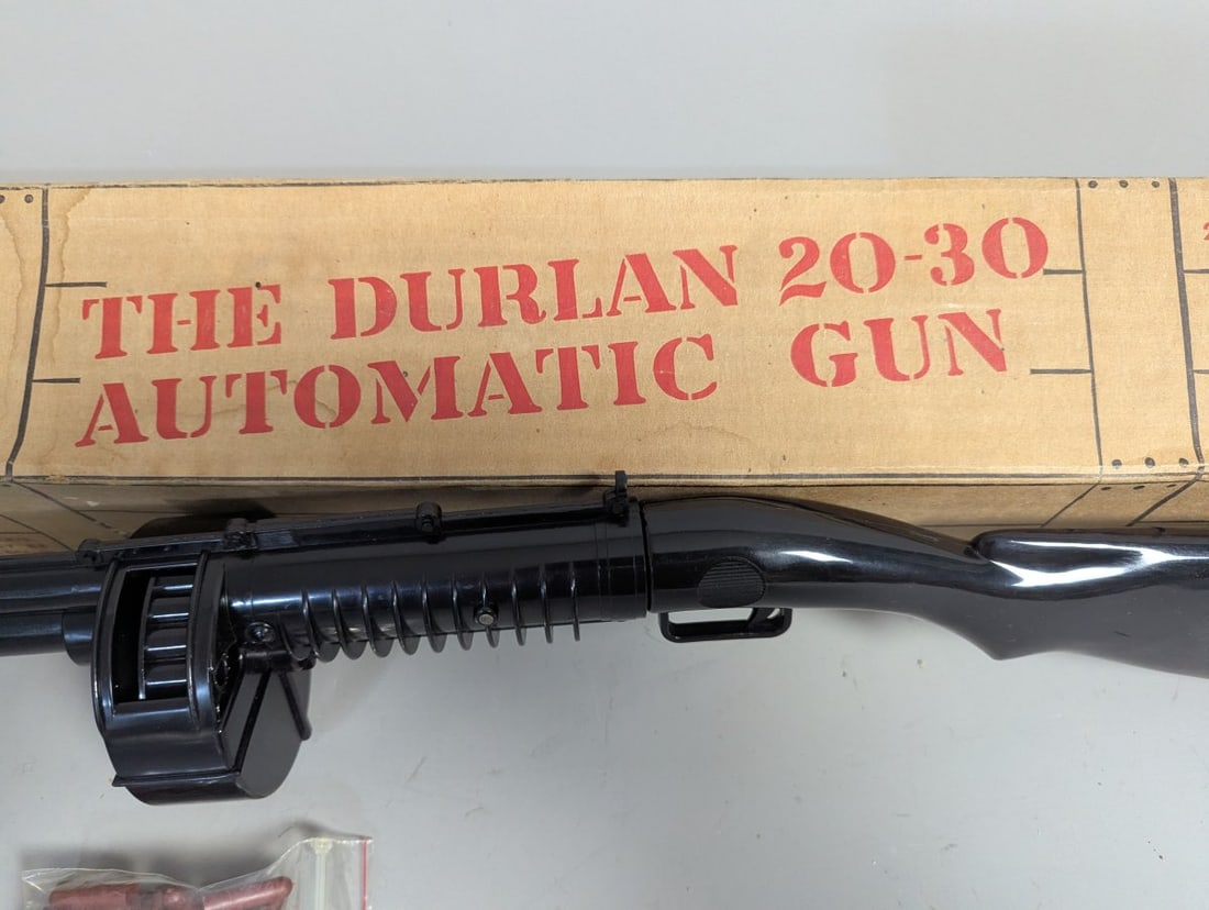Vintage Durlan 20-30 Automatic Toy Gun with Original Box and Bullets Collectible Classic: **Important** Please read below description on how to avoid high shipping costs. Discover a classic piece of collectible history with this Vintage Durlan 20-30 Automatic Toy Gun. Measuring 26 x 4 1/2