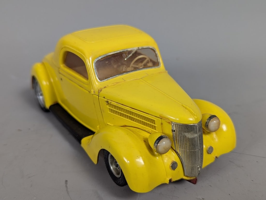 Vintage 1960s 1/24 Scale 1936 Ford Coupe Slot Car Collectible Not Tested: **Important** Please read below description on how to avoid high shipping costs. Up for auction is a Vintage 1960s 1/24 Scale 1936 Ford Coupe Slot Car. This classic collectible is noted as 'Not tested