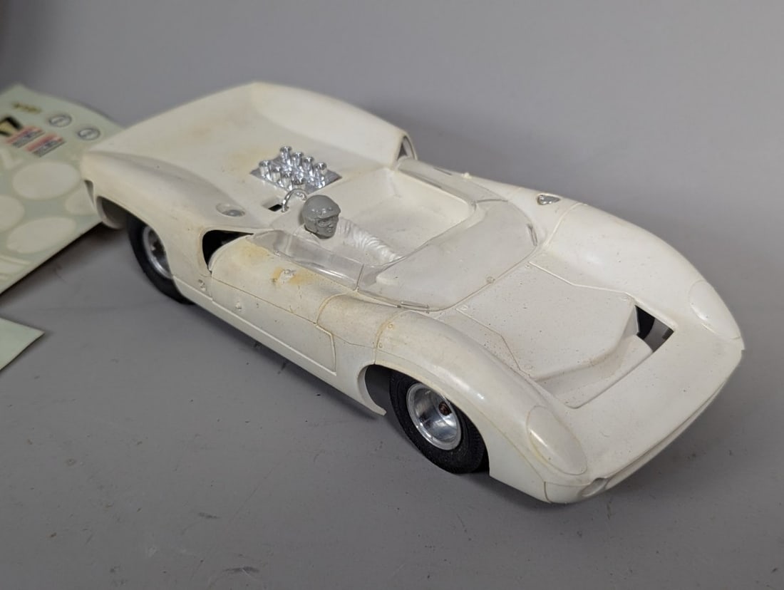 Vintage 1966 Atlas Lola T-70 Slot Racer Kit Highly Collectible: **Important** Please read below description on how to avoid high shipping costs. Don't miss out on this Vintage 1966 Atlas Lola T-70 1/24 Scale Slot Racer Kit. An exciting find for collectors, this