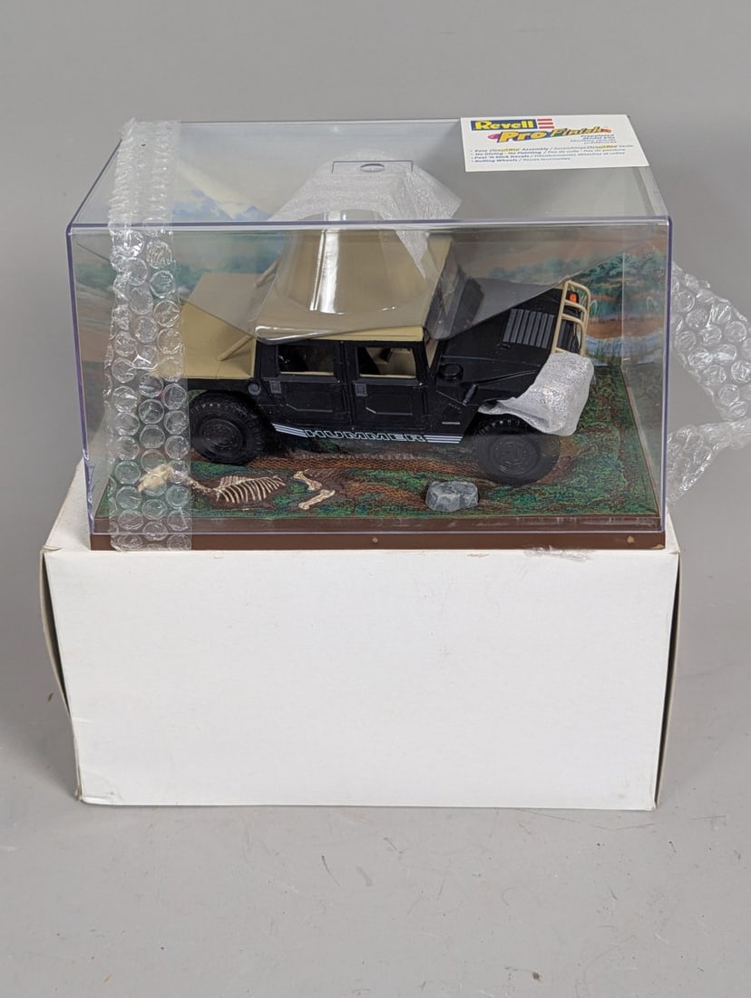 Revell Pro Finish SnapTite Hummer Diorama Model Kit Black Tan Collectible: **Important** Please read below description on how to avoid high shipping costs. This complete Revell Pro Finish SnapTite model kit features a stunning black Hummer with a tan top, beautifully