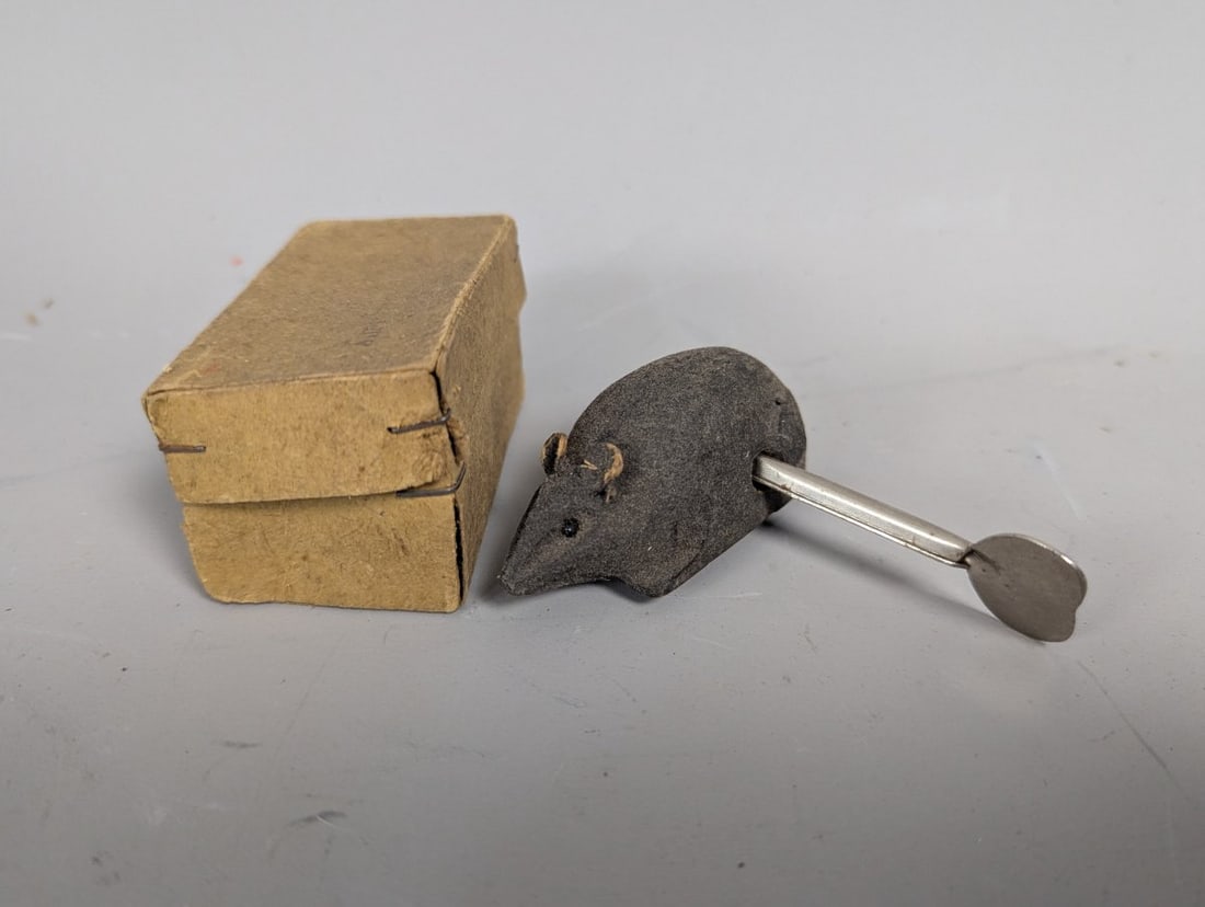 Georg Kohler Vintage Wind-Up Mouse Toy Made in Germany Collectible: **Important** Please read below description on how to avoid high shipping costs. This charming wind-up mouse toy measures 2 3/4 x 1 1/4 x 1 1/4 and was made in Germany. While it may be missing its tai
