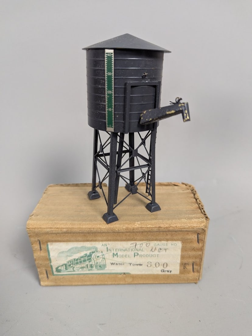 International Model Products HO OO Gauge Water Tower Vintage Die-Cast Collectible: **Important** Please read below description on how to avoid high shipping costs. This exquisite 5 1/4 x 2 1/2 x 2 1/2 model is new old stock, making it a sought-after addition for collectors. Your pur