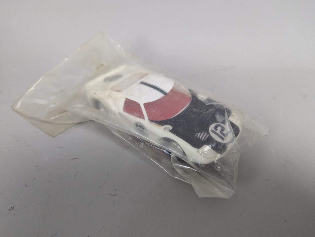 Aurora Thunderjet Ford GT40 HO Scale Slot Car Vintage New Old Stock Collectible: **Important** Please read below description on how to avoid high shipping costs. Up for auction is a rare Aurora Thunderjet (T-Jet) Ford GT40 HO Scale Slot Car, measuring 5 x 2 1/4 x 1 1/4 inches.