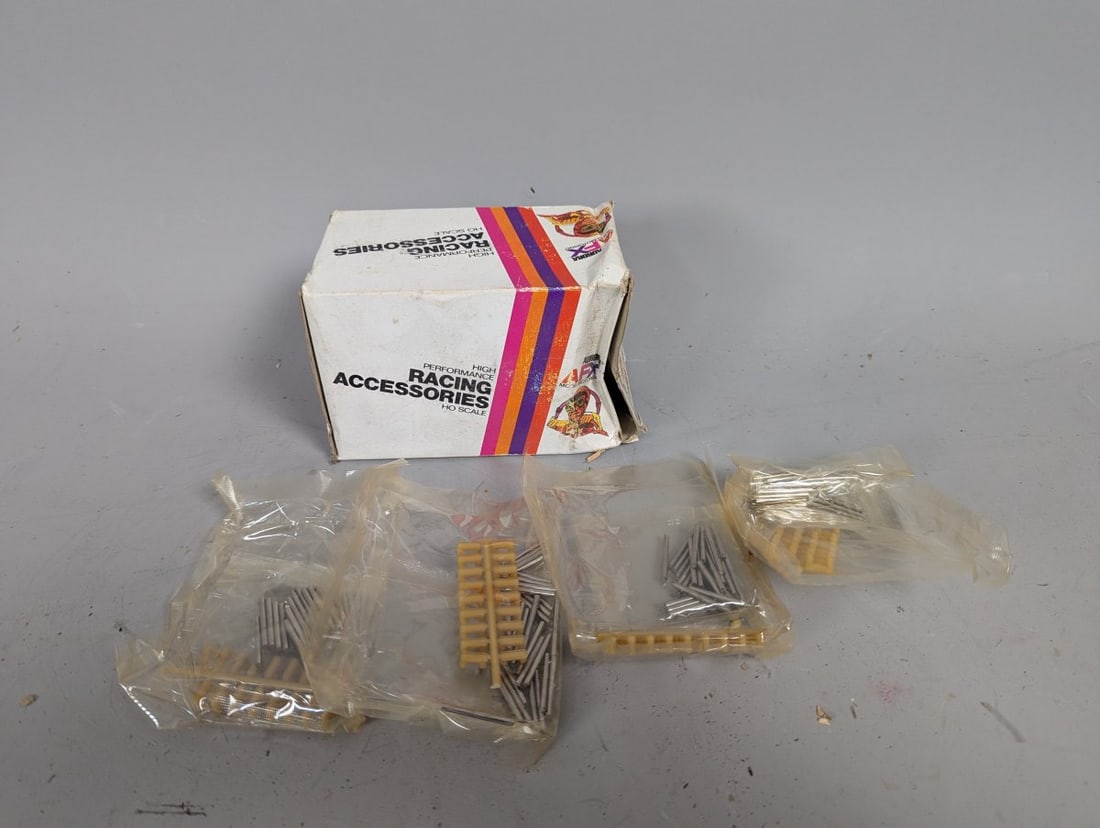 Aurora AFX High Performance Racing Joiners & Locks NOS Item No. 1531 for Collectors: **Important** Please read below description on how to avoid high shipping costs. Up for auction is a vintage Aurora AFX Model Motoring Joiners & Locks, Item No. 1531. This new old stock (NOS) item