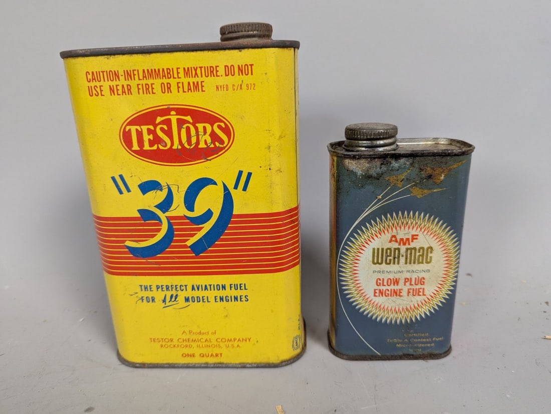 Vintage Model Engine Fuel Can Collection Testors AMF Wen-Mac Petroliana Display: **Important** Please read below description on how to avoid high shipping costs. This listing features a distinct collection of two vintage model engine fuel cans, both empty, perfect for display.