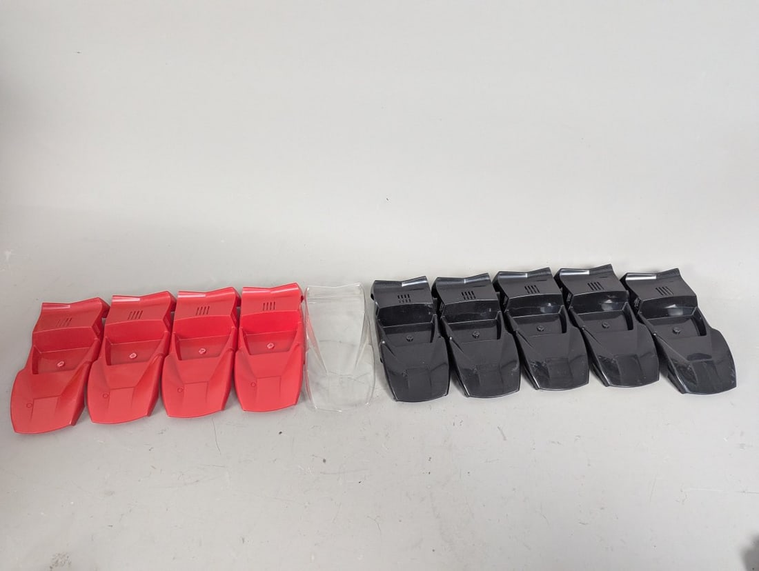 Lot of 10 Bat Style Slot Car Bodies NOS for Collectors and Racers: **Important** Please read below description on how to avoid high shipping costs. Up for auction is a fantastic lot of 10 Bat style slot car bodies, measuring 6 1/2 x 3 x 1 1/4 inches. This collection
