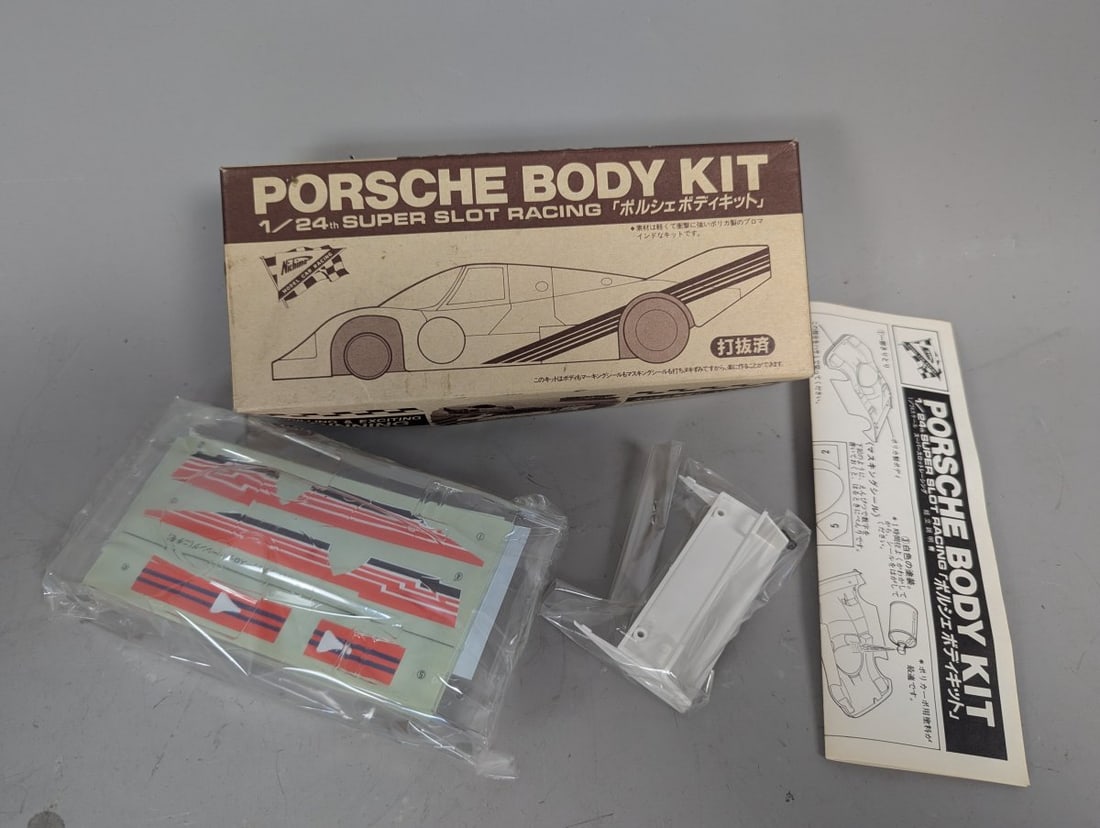 Nichimo 1/24 Super Slot Racing Porsche Body Kit SSR2403-1000 Vintage Model Kit: **Important** Please read below description on how to avoid high shipping costs. Up for auction is a rare Nichimo 1/24 Super Slot Racing Porsche Body Kit (SSR2403-1000). This item is 'New Old Stock' a