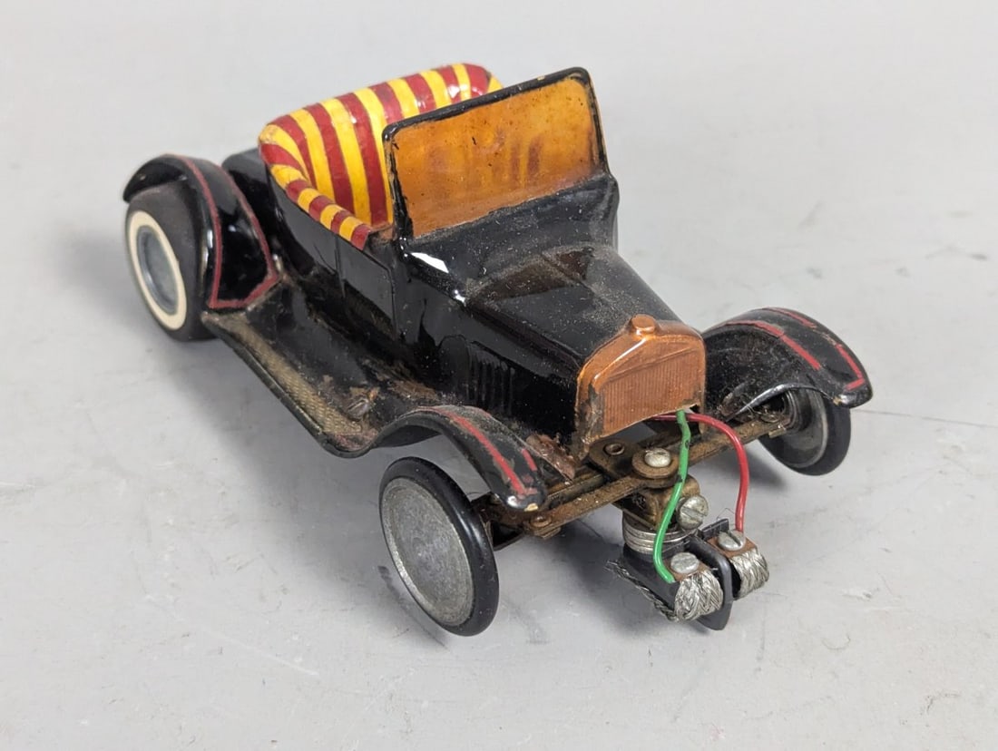Vintage Scratch-Built Model T Roadster Slot Car Collectible 1/24 or 1/32 Scale: **Important** Please read below description on how to avoid high shipping costs. Up for auction is a Vintage Scratch-Built Model T Roadster Slot Car that measures approximately 5 x 3 x 3 high. This un