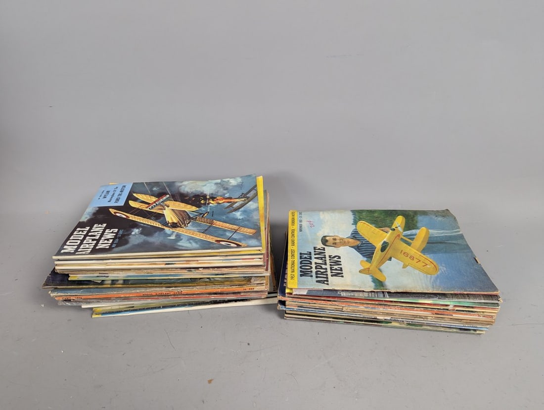 Lot of 54 Model Airplane News Magazines 1930s-1960s Vibrant Covers for Collectors: **Important** Please read below description on how to avoid high shipping costs. Discover this exceptional Lot of 54 Model Airplane News magazines from the 1930s to 1960s, a must-have collection for a