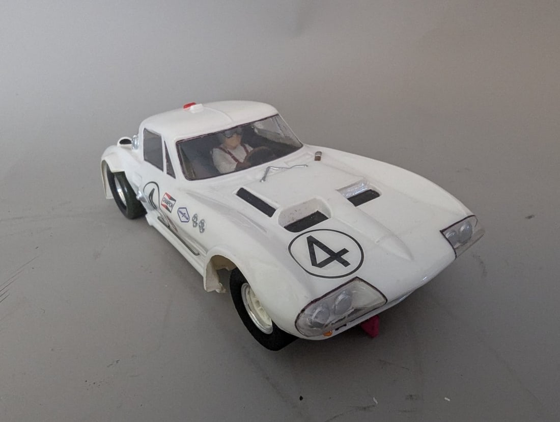 Custom-Built 1/24 Scale 1963 Chevrolet Corvette Grand Sport Slot Car by Tom Anderson: **Important** Please read below description on how to avoid high shipping costs. Experience the thrill of racing with this Custom-Built 1/24 Scale 1963 Chevrolet Corvette Grand Sport Slot Car. This
