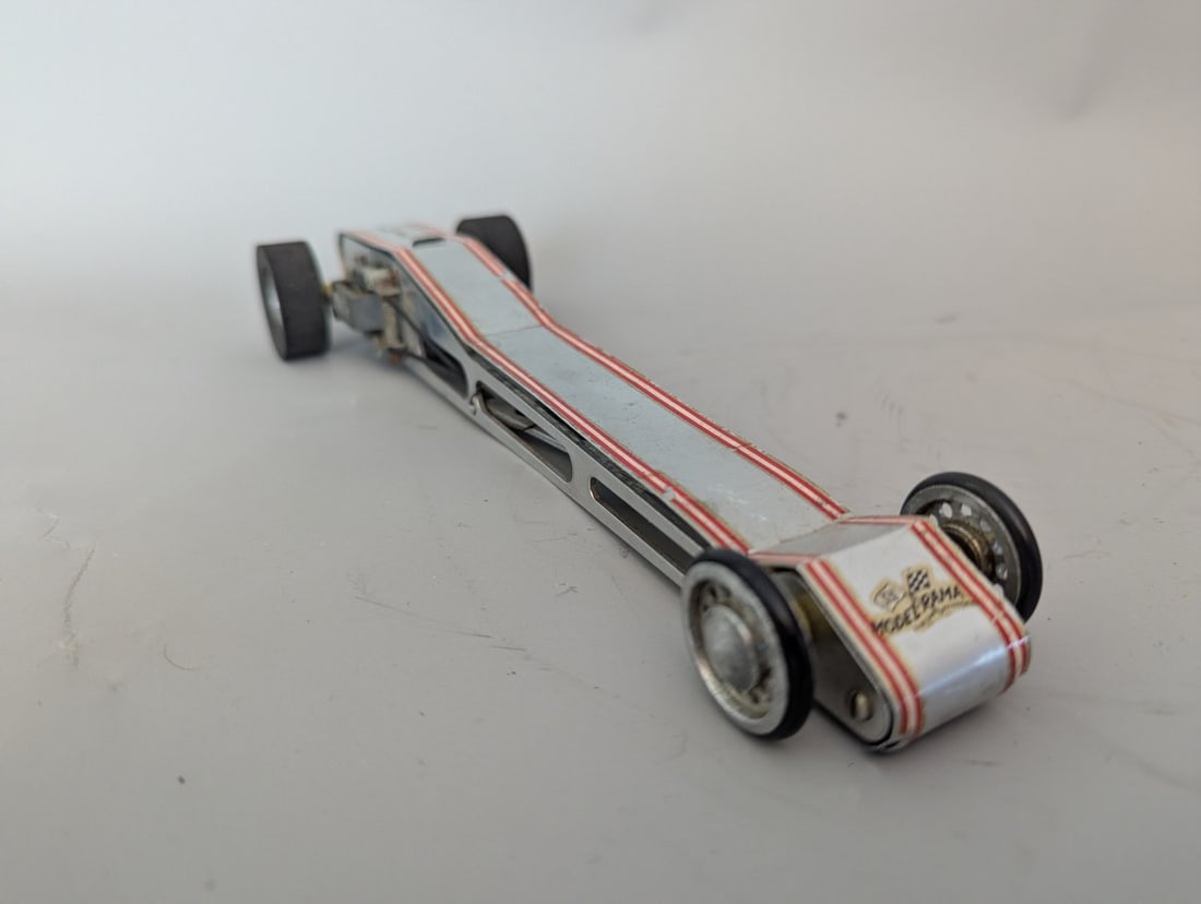 Vintage 1960s USA Model-Rama Rail Dragster Slot Car Collectible Racing Toy: **Important** Please read below description on how to avoid high shipping costs. This Vintage 1960s U.S.A. Model-Rama Rail Dragster Slot Car is a collector's dream! Tested and in working order, this