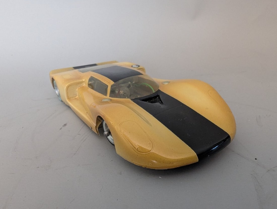 Vintage 1960s Dynamic Bandit Slot Car 1/24 Scale Racing Collectible Model: **Important** Please read below description on how to avoid high shipping costs. Up for auction is a Vintage 1960s Dynamic 'Bandit' 1/24 Scale Slot Car. This item has been tested and is in working ord
