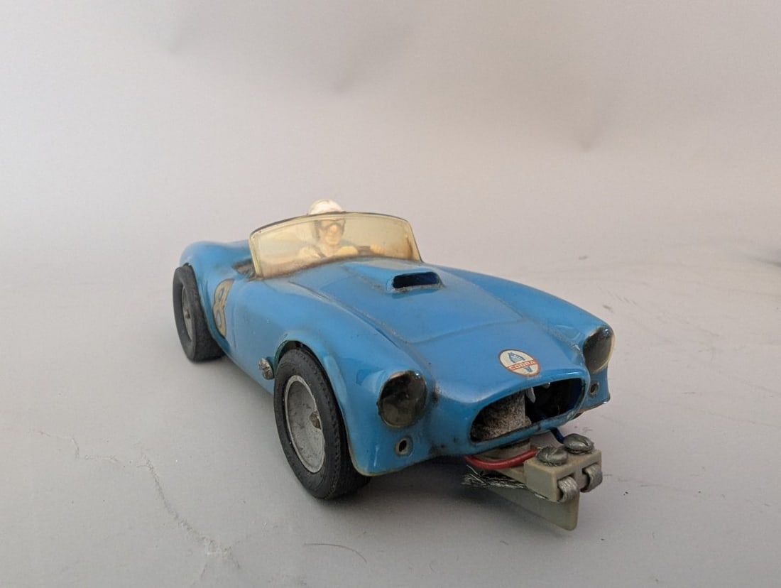 Vintage 1960s 1/32 Scale Shelby Cobra Slot Car Blue #8 Watkins Glen Collectible: **Important** Please read below description on how to avoid high shipping costs. Don't miss this Vintage 1960s 1/32 Scale Shelby Cobra Slot Car, measuring 5 x 2 x 2 1/4. Tested and in working order.