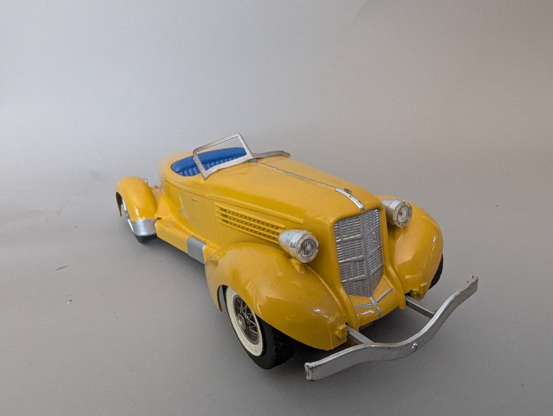 Vintage Battery-Operated Auburn Speedster Slot Car 1935 Collectible Toy Car: **Important** Please read below description on how to avoid high shipping costs. Up for auction is a Vintage Battery-Operated 1935 Auburn Speedster Slot Car. This item has been tested and is in
