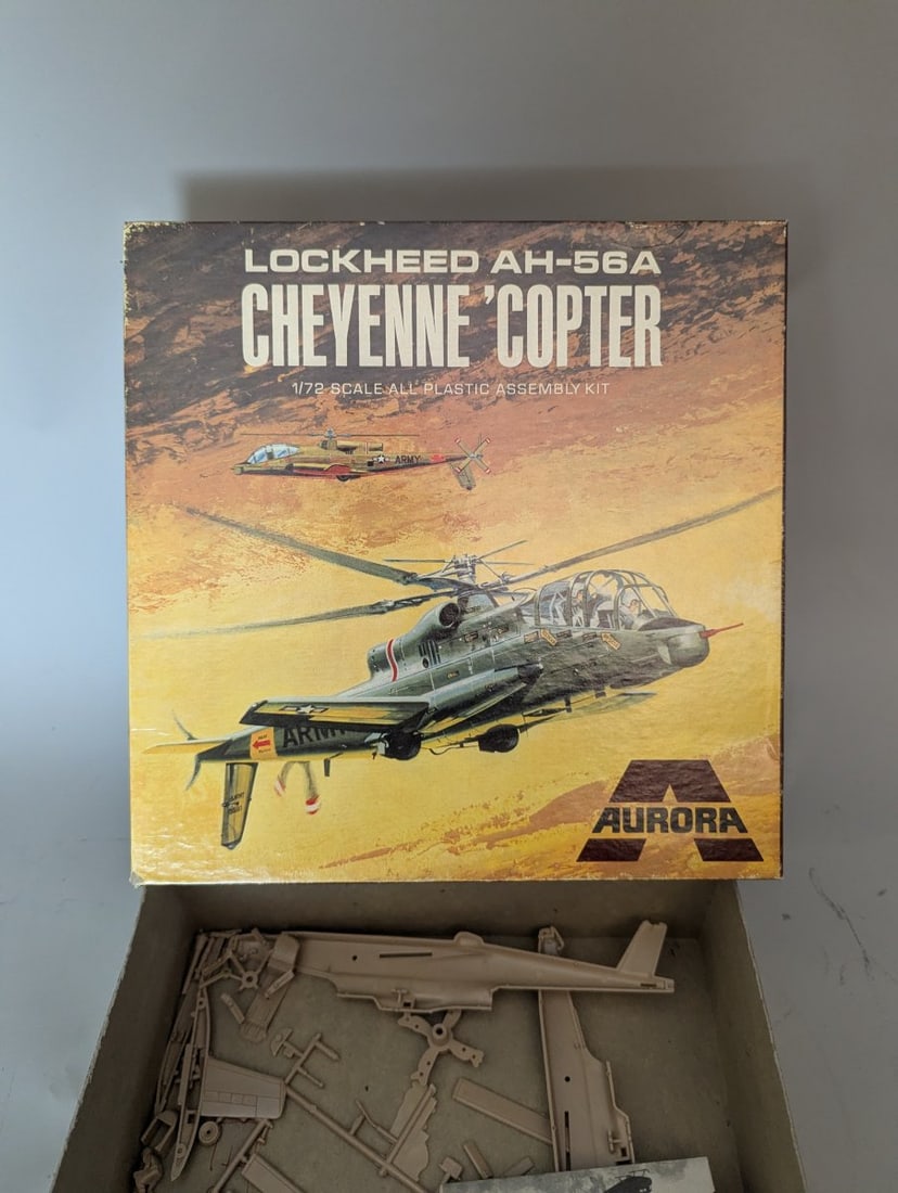 Vintage Aurora Lockheed AH-56A Cheyenne Model Kit with Original Box Art Painting: **Important** Please read below description on how to avoid high shipping costs. This auction features a rare set comprising a vintage 1969 Aurora Lockheed AH-56A Cheyenne model kit (No. 502) and the