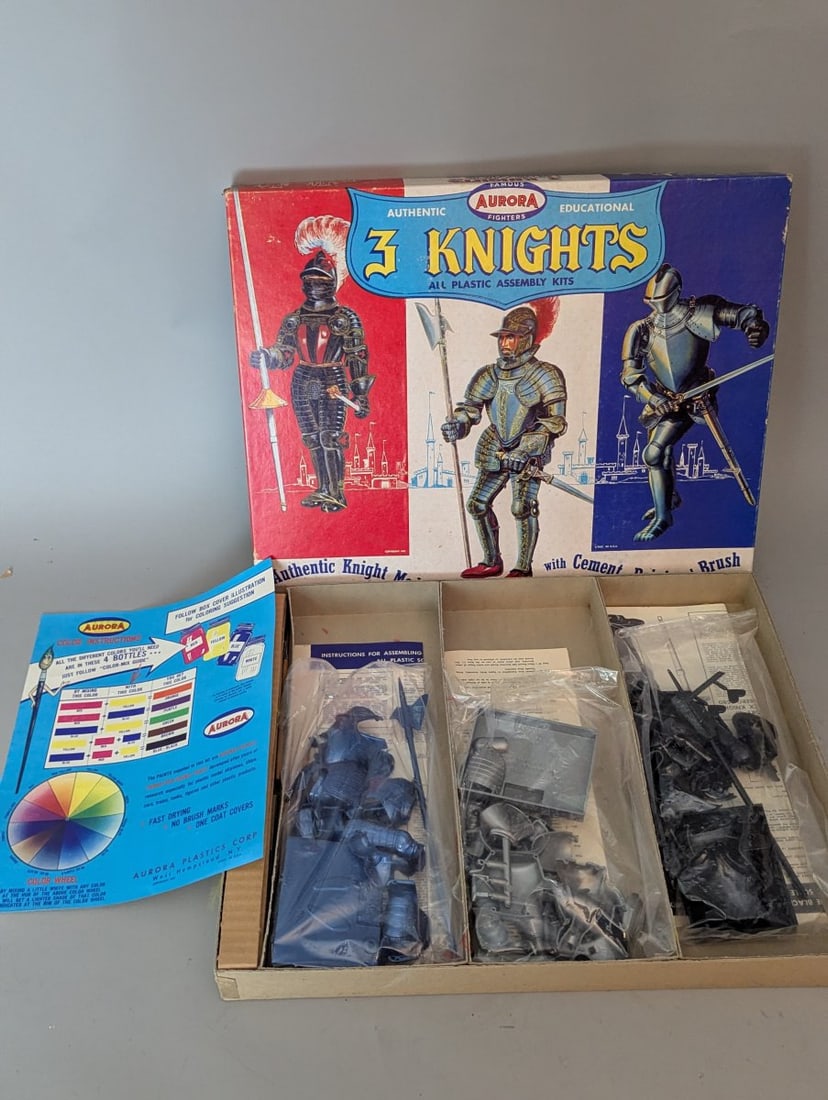 Vintage 1957 Aurora 3 Knights Plastic Assembly Model Kit Unbuilt Collectible Set: **Important** Please read below description on how to avoid high shipping costs. Up for auction is a fantastic find: a Vintage 1957 Aurora '3 Knights' All Plastic Assembly Kit, measuring 16 1/2 x 13 x