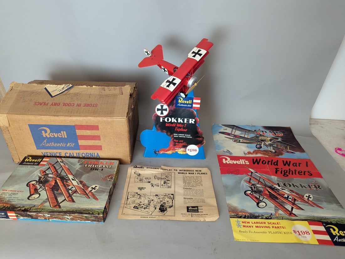 1957 Revell Fokker Triplane Model Kit Complete Store Display Set with Original Materials: **Important** Please read below description on how to avoid high shipping costs. This auction features a rare complete store display set from 1957, including a New Old Stock (NOS) model kit, the