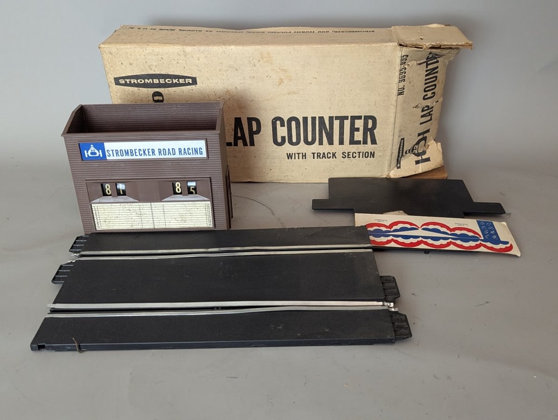 Vintage Strombecker Road Racing Lap Counter Set No. 9595 Slot Car Accessory: **Important** Please read below description on how to avoid high shipping costs. Up for auction is a Vintage Strombecker Road Racing Lap Counter Set, No. 9595, complete with lap counter building, two
