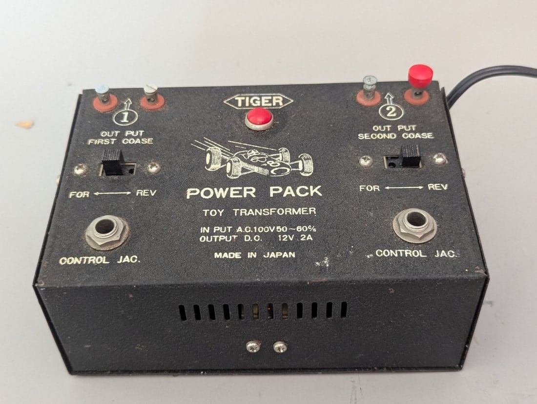 Vintage Tiger Power Pack Toy Transformer Slot Car Controller Made In Japan: **Important** Please read below description on how to avoid high shipping costs. This Vintage Tiger Power Pack Toy Transformer measures 6 x 4 x 2 1/2. Turns on and lights up. Not tested any further.