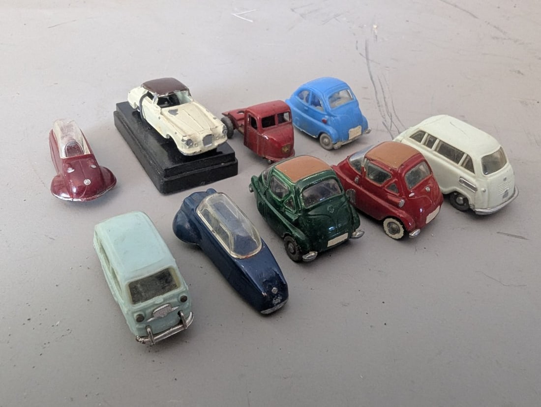 Vintage European Microcar Collection 9 Miniature Die-Cast Model Cars Siku Mini-Cars: **Important** Please read below description on how to avoid high shipping costs. Explore this delightful collection of nine vintage small-scale model cars, primarily focusing on European microcars fro