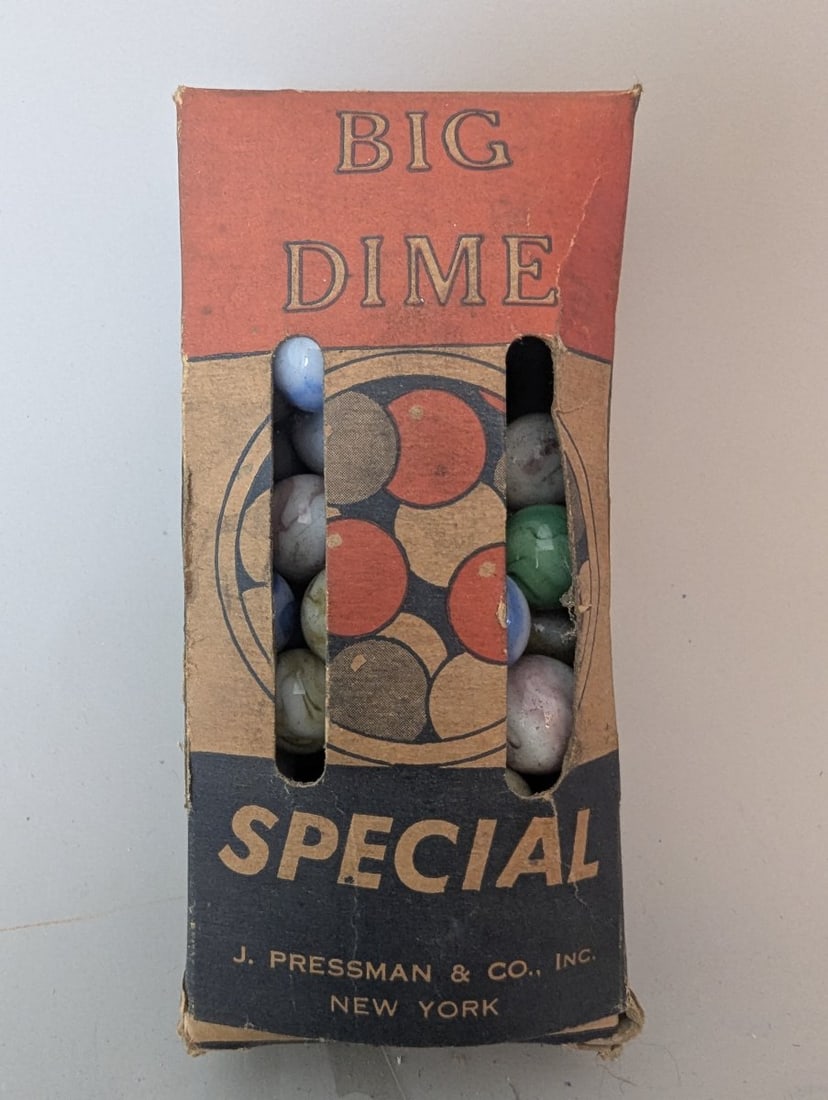 Vintage J. Pressman & Co. Big Dime Special Box of Marbles Collectible Toy: **Important** Please read below description on how to avoid high shipping costs. Up for auction is a vintage J. Pressman & Co. 'Big Dime Special' box of marbles, measuring 5 x 2 1/2 x 1 1/2 inches.