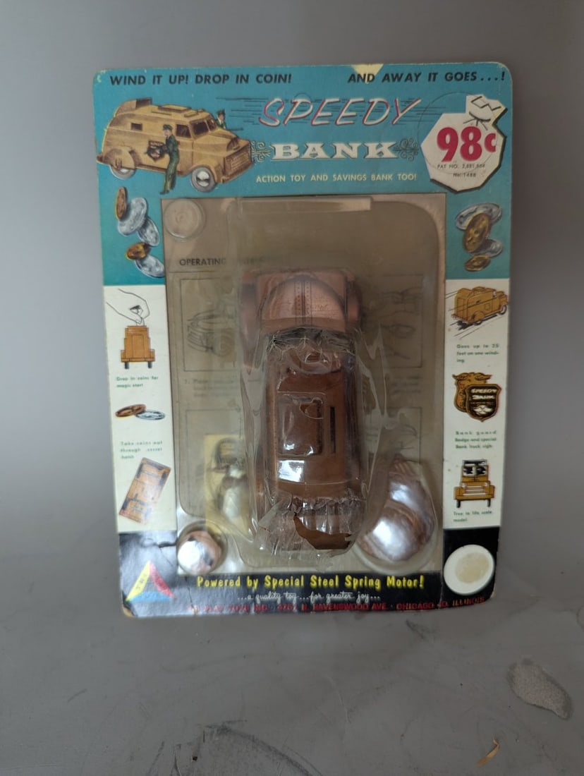 Vintage Tri-Play Toys Speedy Bank Armored Car Wind-Up Toy Collector's Item: **Important** Please read below description on how to avoid high shipping costs. Up for auction is a fantastic piece of nostalgia: the Tri-Play Toys Speedy Bank, measuring 8 x 11 x 3 3/4 inches. This