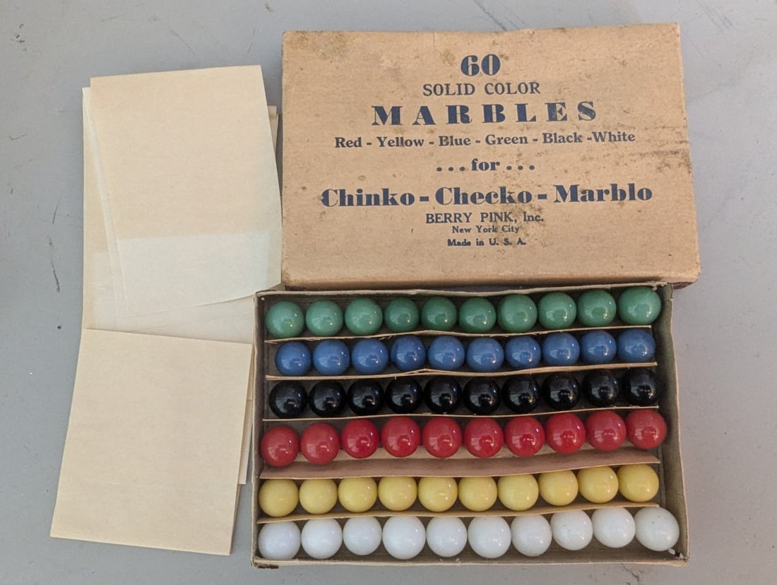 Vintage Berry Pink Inc. Chinko-Checko-Marblo 60 Solid Color Marbles Set NOS: **Important** Please read below description on how to avoid high shipping costs. This Vintage Berry Pink Inc. "Chinko-Checko-Marblo" set contains 60 solid color marbles, impeccably preserved as New