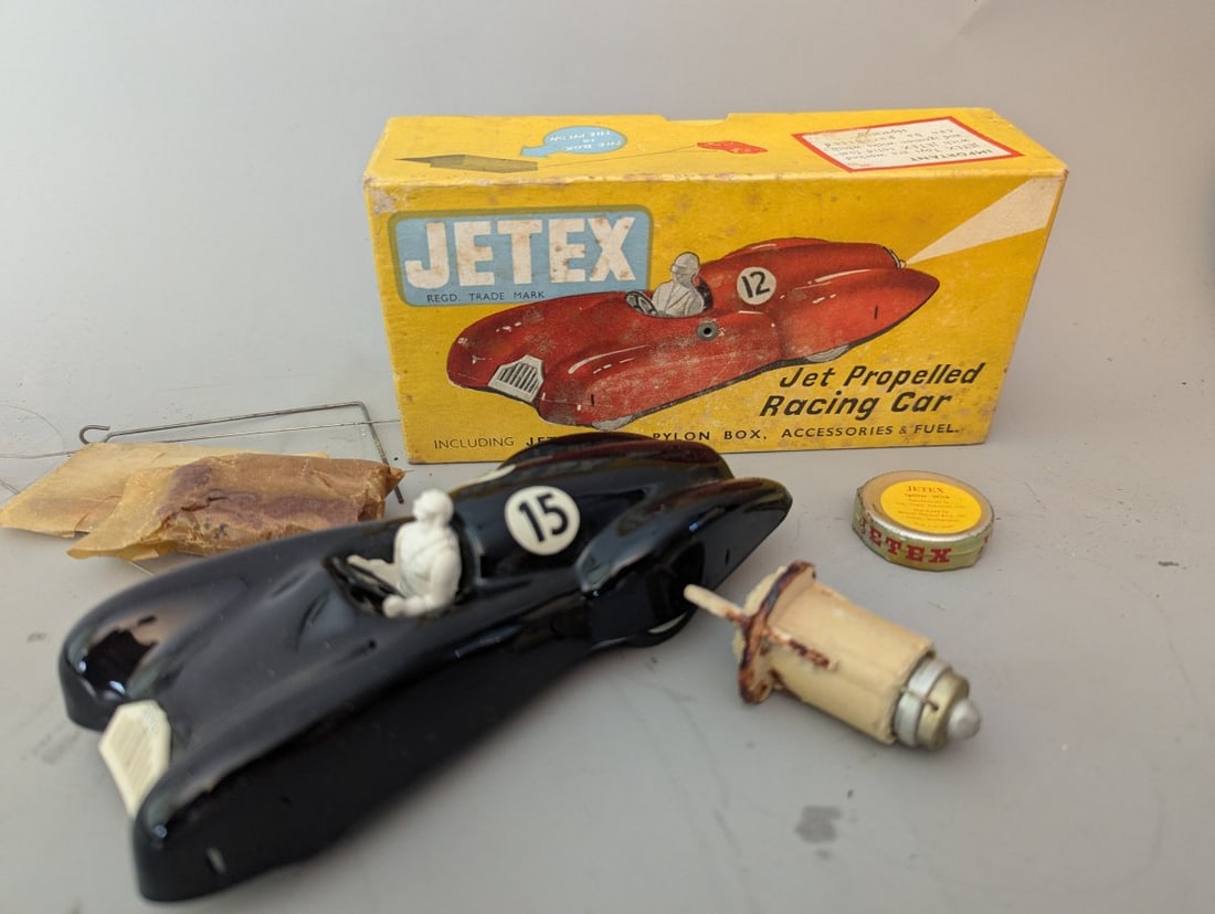 Vintage Jetex Jet Propelled Racing Car Set with Accessories and Original Box: **Important** Please read below description on how to avoid high shipping costs. Up for auction is a stunning vintage Jetex Jet Propelled Racing Car Set, a rare find in new old stock condition. This